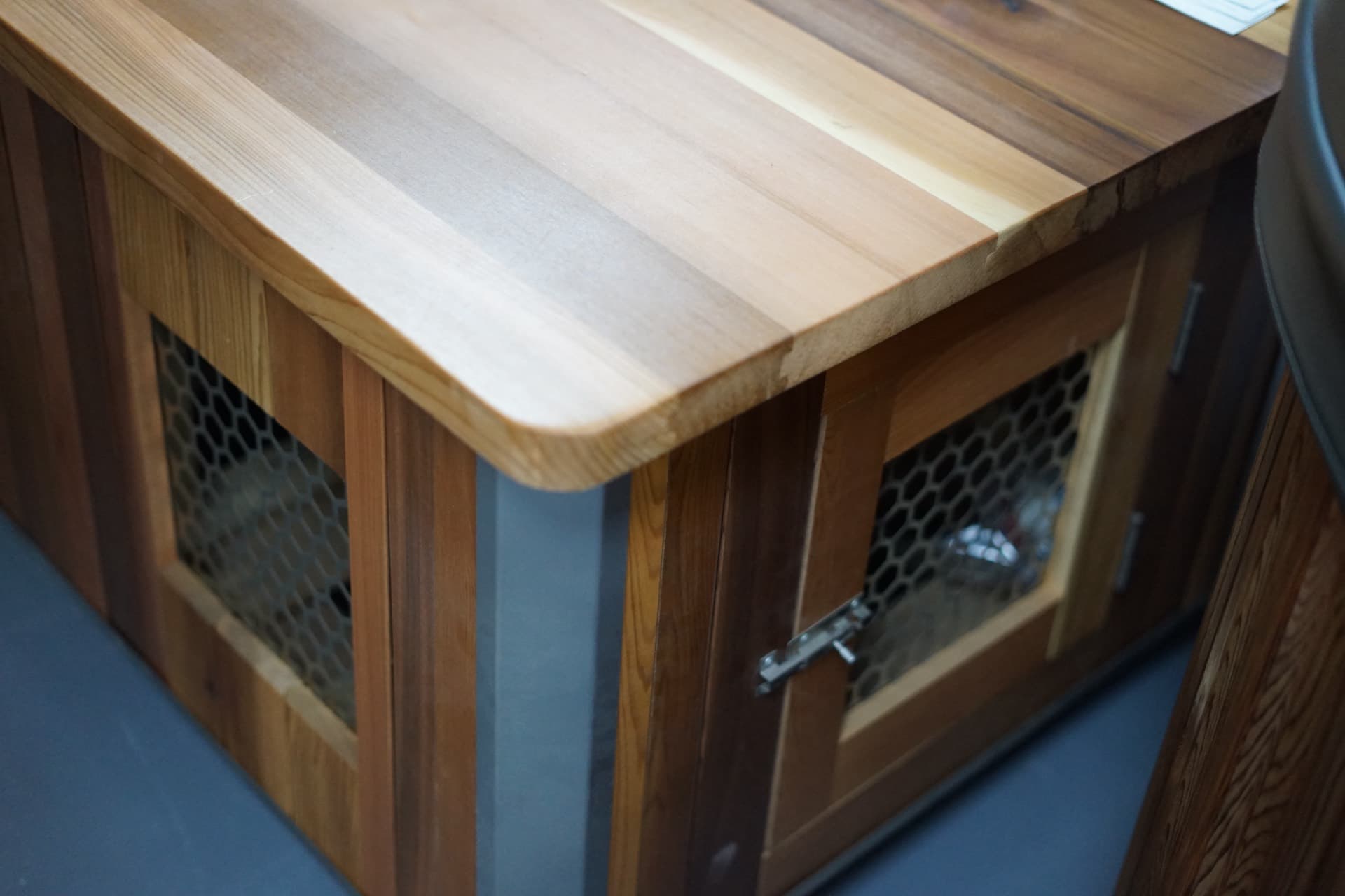 Cedar exterior and the vented cabinet that houses the chiller